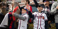 Young fans celebrate as Braves players pass by during the teams’ victory parade in Cobb County on Nov. 5.