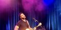 Tony Evans Jr. sings and plays guitar.