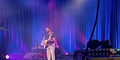 Tony Evans Jr. sings and plays guitar.