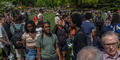 Crowds gather in a Macon, Ga. park on April 8, 2024 to view the solar eclipse.