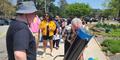 Visitors line up to use the telescope at Fernbank Science Center April 8, 2024 to view the solar eclipse.