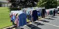The racks of clothes for children for infants, kids, and teenagers to choose from at the Bloom Closet Express stop in Fulton County.