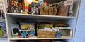 Toys and board games inside the Bloom Closet Express truck.