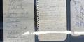 A written list of ideas sits to the left of a handwritten letter and Martin Luther King Jr.'s personal phone number, all written or exchanged in jail during the Civil Rights Movement.