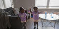 Journey, left, and Justice, right, play together at home.
