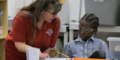 Georgia teacher, Karen Gorzynski, explains CCCs, or Crosscutting Concepts, to her Douglas County student.