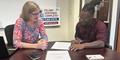 Ann Colloton and Dominique Harris work on outreach to spread the word that people who have a felony conviction in their past may be eligible to vote. 