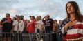 Trump supporters stand for the national anthem at the start of the Trump rally in Macon, Ga. Sunday.