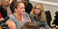 Jami Wallace, president of the Unity Council for the East Palestine Train Derailment, sits with fellow resident Tamara Lynn Freeze.