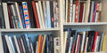 A bookshelf in Elton John's Atlanta residence shows a selection from approximately 2000 photography titles donated to the Emory University libraries by the musician in 2024