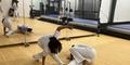 Students practice the Afro-Brazilian martial art of capoeira at Filhos de Bimba, a capoeira school in Atlanta.
