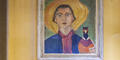 Flannery O’Connor’s portrait of herself with a pheasant, on display with many other paintings by the author often touted as the finest writer of the Southern Gothic, on the grounds of the farm in Milledgeville where she spent her adult life.